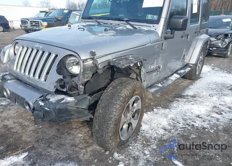 2016 Jeep Wrangler Unlimited Sahara z USA, uszkodzony, nr VIN 1C4BJWEG6GL201361